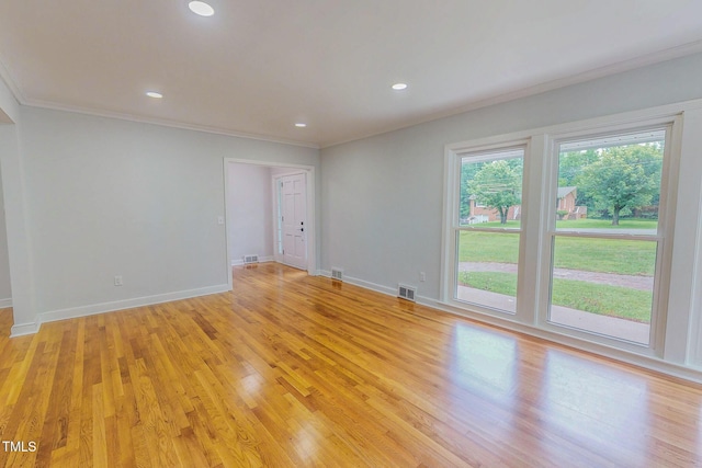 303 Winhaven St, Roxboro, NC 27573 - unfurnished room featuring ornamental molding, light wood-type flooring, and recessed lighting