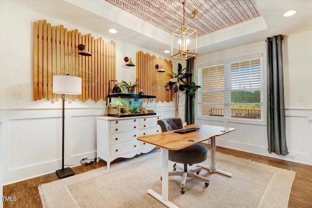 52 Summit Overlook Dr, Clayton, NC 27527 - office featuring a tray ceiling, crown molding, a decorative wall, wood finished floors, and a wainscoted wall