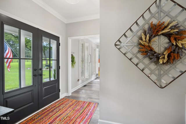 633 Fleming Rd, Youngsville, NC 27596 - entryway featuring french doors, wood finished floors, and crown molding