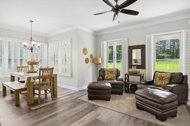 633 Fleming Rd, Youngsville, NC 27596 - living area with wood finished floors, a chandelier, ceiling fan, and ornamental molding