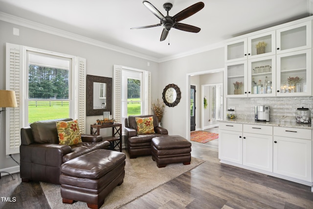 633 Fleming Rd, Youngsville, NC 27596 - living area with crown molding, dark wood-type flooring, and a ceiling fan
