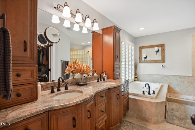 633 Fleming Rd, Youngsville, NC 27596 - full bathroom featuring double vanity, a garden tub, tile patterned floors, and a walk in closet