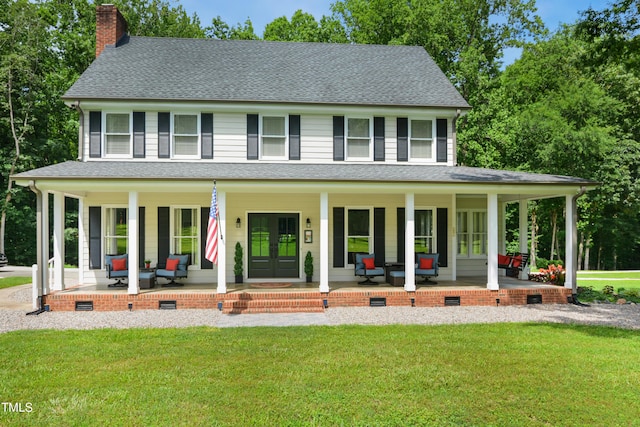 633 Fleming Rd, Youngsville, NC 27596 - view of front of house with french doors, a porch, a chimney, and a shingled roof