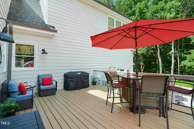 633 Fleming Rd, Youngsville, NC 27596 - deck featuring a grill and outdoor dining area