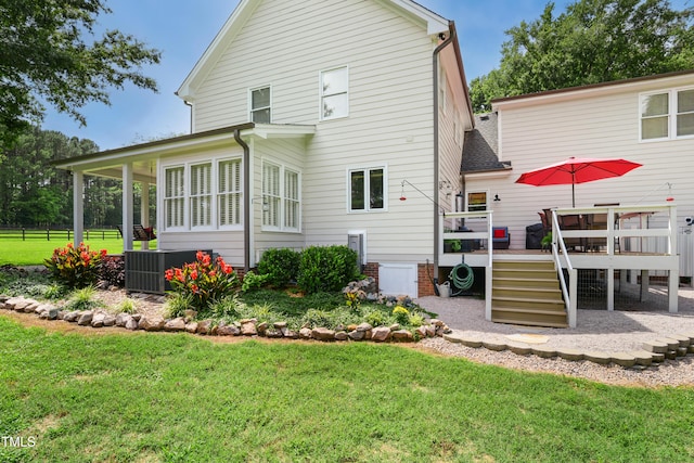 633 Fleming Rd, Youngsville, NC 27596 - back of house with a wooden deck