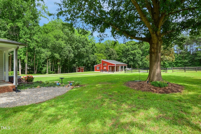 633 Fleming Rd, Youngsville, NC 27596 - view of yard with an outdoor structure