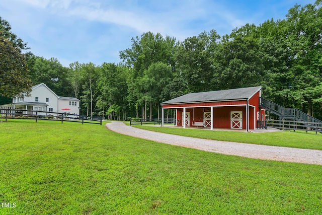 633 Fleming Rd, Youngsville, NC 27596 - view of yard with an exterior structure and an outbuilding