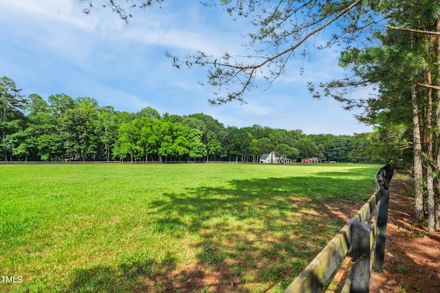 633 Fleming Rd, Youngsville, NC 27596 - view of green lawn with a wooded view