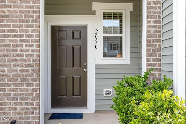 2050 Trailside Dr, Durham, NC 27704 - view of exterior entry with brick siding