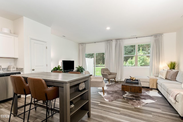 2050 Trailside Dr, Durham, NC 27704 - living area with light wood-style floors and recessed lighting
