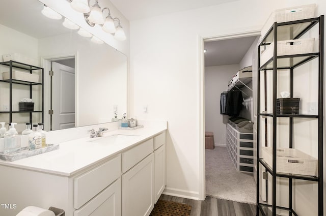2050 Trailside Dr, Durham, NC 27704 - bathroom with vanity and wood finished floors