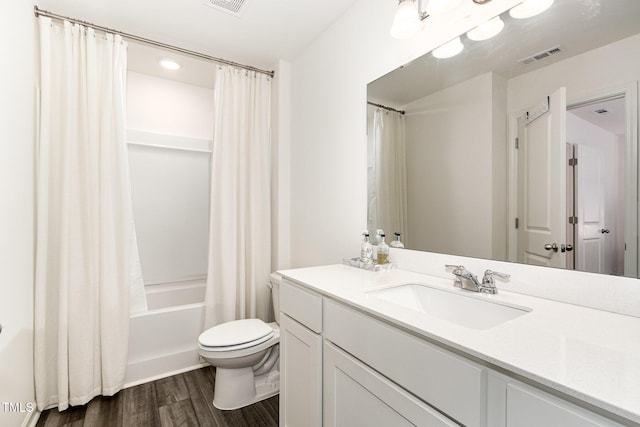 2050 Trailside Dr, Durham, NC 27704 - bathroom featuring vanity, wood finished floors, and shower / tub combo with curtain