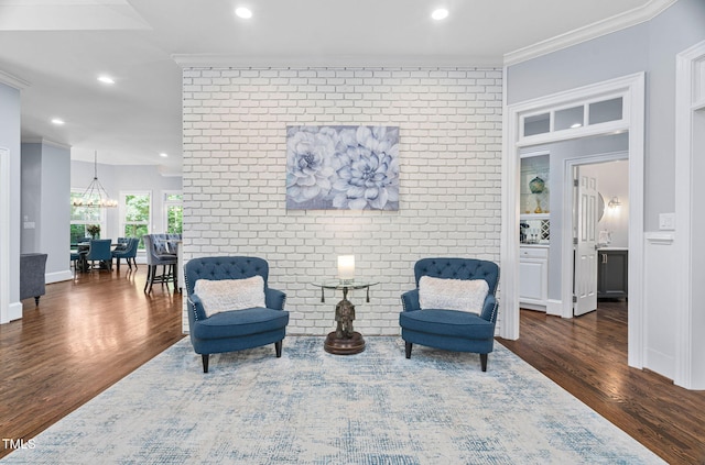 114 Kendleton Pl, Cary, NC 27518 - sitting room featuring wood finished floors, crown molding, recessed lighting, and a chandelier
