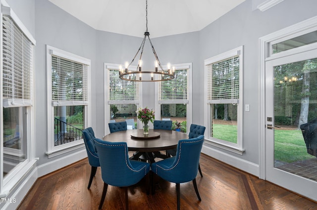 114 Kendleton Pl, Cary, NC 27518 - dining space featuring a chandelier, vaulted ceiling, and wood finished floors