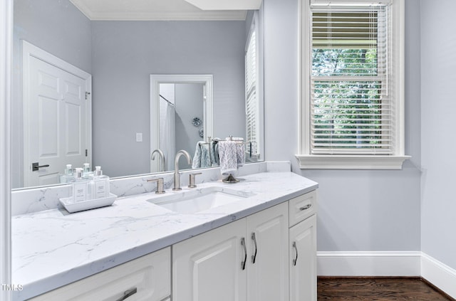 114 Kendleton Pl, Cary, NC 27518 - full bath with vanity, ornamental molding, wood finished floors, and a shower