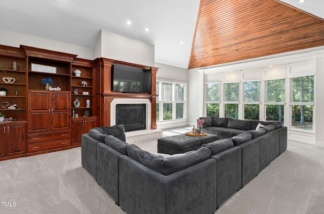 114 Kendleton Pl, Cary, NC 27518 - living room with light colored carpet, a brick fireplace, high vaulted ceiling, and recessed lighting