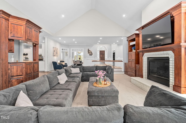 114 Kendleton Pl, Cary, NC 27518 - living room with high vaulted ceiling, light carpet, recessed lighting, and a brick fireplace