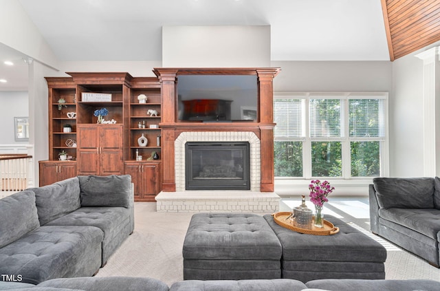 114 Kendleton Pl, Cary, NC 27518 - living area featuring vaulted ceiling, carpet, radiator heating unit, and a fireplace