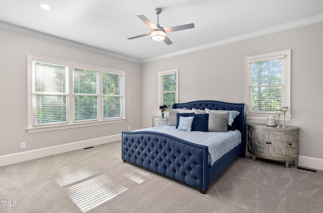 114 Kendleton Pl, Cary, NC 27518 - carpeted bedroom with multiple windows, ornamental molding, and ceiling fan