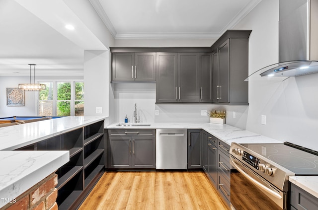114 Kendleton Pl, Cary, NC 27518 - kitchen with appliances with stainless steel finishes, wall chimney exhaust hood, light stone countertops, light wood-style flooring, and gray cabinets
