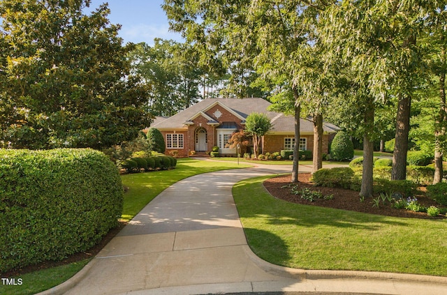 114 Kendleton Pl, Cary, NC 27518 - view of front of home featuring a front yard and brick siding