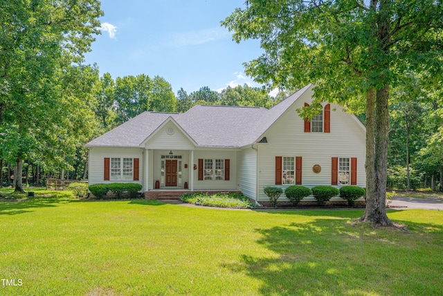 300 Williamston Ridge Dr, Youngsville, NC 27596 - view of front of property featuring a front lawn and a shingled roof