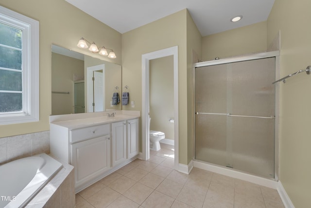 300 Williamston Ridge Dr, Youngsville, NC 27596 - bathroom featuring tile patterned flooring, a bath, vanity, and a shower stall