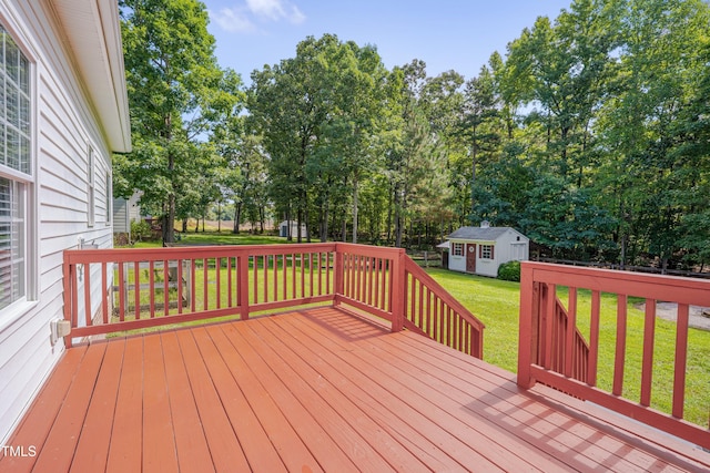 300 Williamston Ridge Dr, Youngsville, NC 27596 - wooden deck with a yard, an outbuilding, and view of scattered trees
