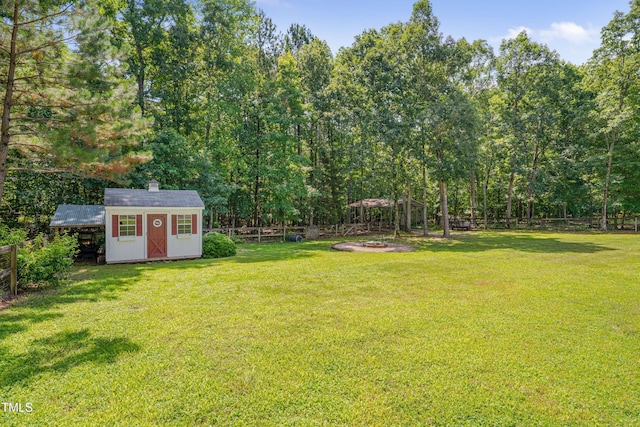 300 Williamston Ridge Dr, Youngsville, NC 27596 - fenced backyard featuring a storage unit
