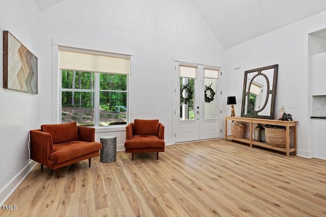 88 Priscilla Ln, Fuquay Varina, NC 27526 - sitting room with plenty of natural light, light wood-type flooring, and high vaulted ceiling