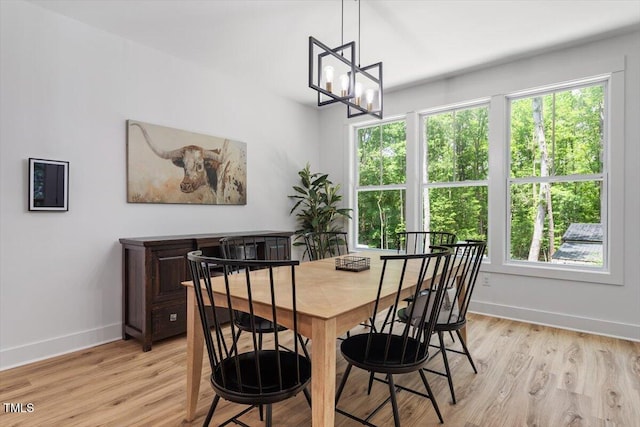 88 Priscilla Ln, Fuquay Varina, NC 27526 - dining area featuring light wood finished floors and a chandelier