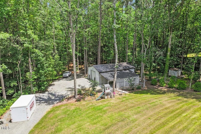88 Priscilla Ln, Fuquay Varina, NC 27526 - view of front of house with a front yard, an outbuilding, and driveway