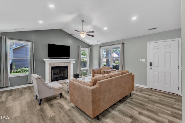 39 All Aboard Cir, Willow Springs, NC 27592 - living room with lofted ceiling, light wood-type flooring, a ceiling fan, a fireplace, and recessed lighting