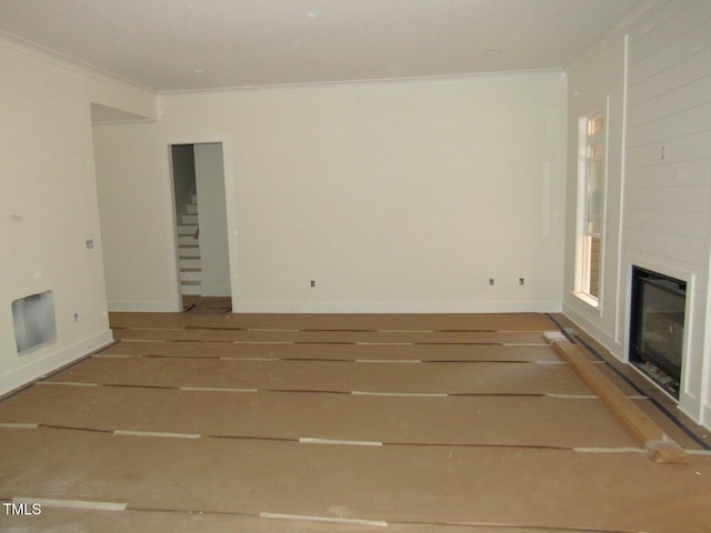 1155 Shonele Ln, Stem, NC 27581 - unfurnished living room featuring ornamental molding and a fireplace