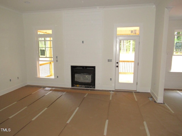 1155 Shonele Ln, Stem, NC 27581 - unfurnished living room featuring ornamental molding and a tile fireplace