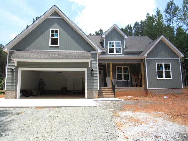 1155 Shonele Ln, Stem, NC 27581 - craftsman-style house featuring a porch, gravel driveway, and roof with shingles