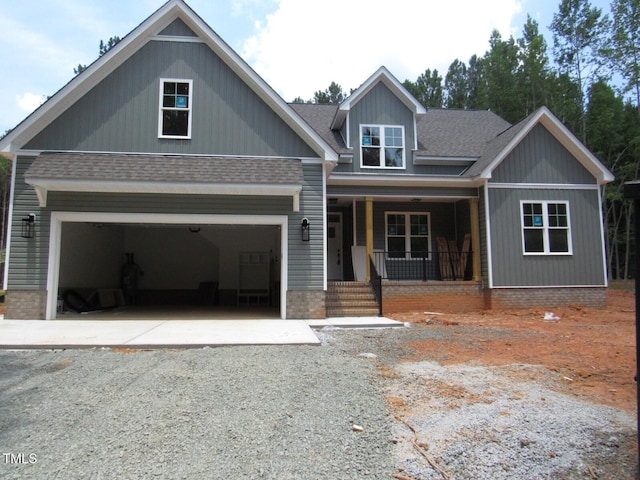 1155 Shonele Ln, Stem, NC 27581 - craftsman-style home with covered porch, driveway, and a shingled roof