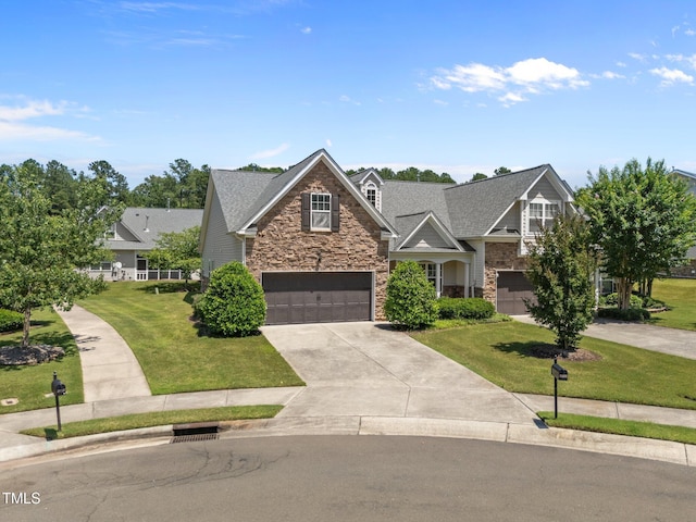 5216 Marcella Ct, Durham, NC 27707 - craftsman inspired home with stone siding, a garage, concrete driveway, and a front lawn
