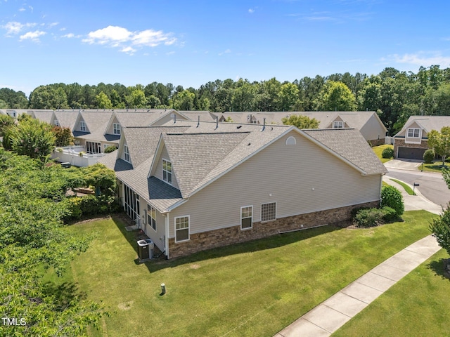5216 Marcella Ct, Durham, NC 27707 - view of subject property with a tree filled landscape