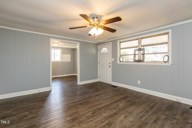 3013 Avery St, Raleigh, NC 27610 - foyer with a ceiling fan, dark wood finished floors, and crown molding