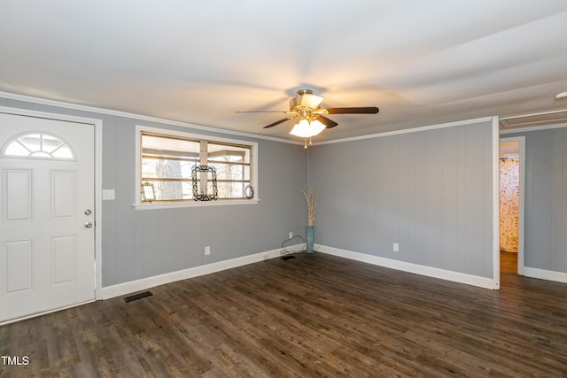 3013 Avery St, Raleigh, NC 27610 - foyer featuring ceiling fan, dark wood-type flooring, and ornamental molding
