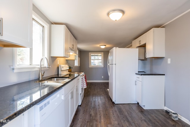 3013 Avery St, Raleigh, NC 27610 - kitchen featuring white appliances, under cabinet range hood, and white cabinetry