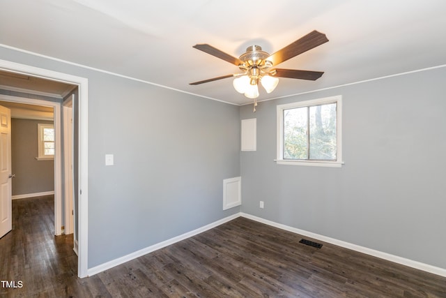 3013 Avery St, Raleigh, NC 27610 - spare room with dark wood-style floors and ceiling fan