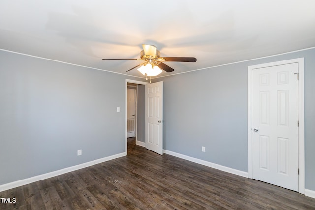 3013 Avery St, Raleigh, NC 27610 - empty room with ceiling fan and dark wood-style flooring