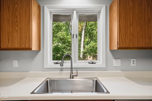 113 Twisted Oak Pl, Durham, NC 27705 - kitchen with light countertops and brown cabinetry