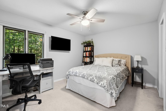 113 Twisted Oak Pl, Durham, NC 27705 - bedroom with light carpet, an office area, and a ceiling fan