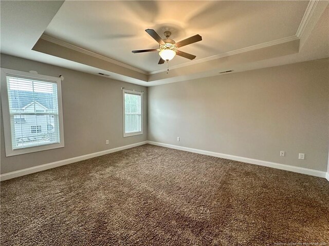 3014 Eaglecrest Ln, Fayetteville, NC 28306 - carpeted empty room featuring a raised ceiling, ornamental molding, healthy amount of natural light, and ceiling fan