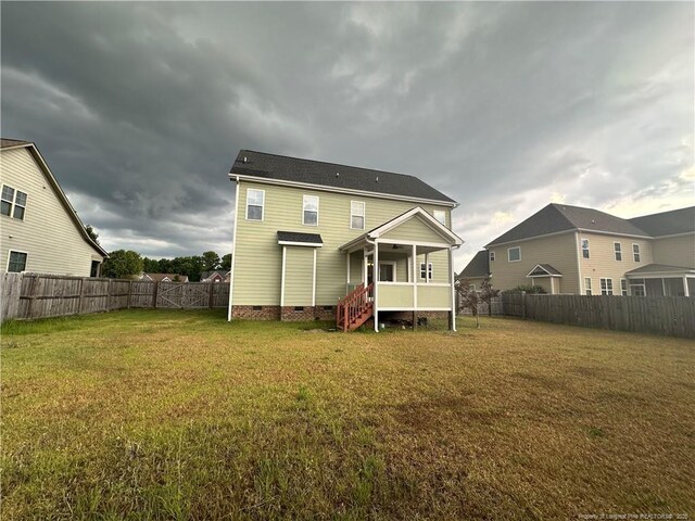 3014 Eaglecrest Ln, Fayetteville, NC 28306 - rear view of house featuring crawl space and a fenced backyard