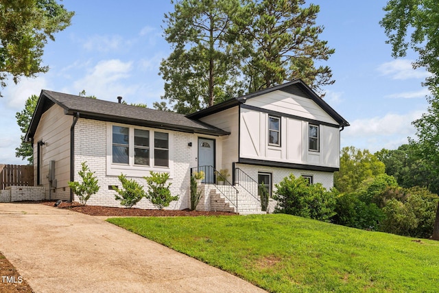 5400 Kaplan Dr, Raleigh, NC 27606 - split level home with brick siding and driveway