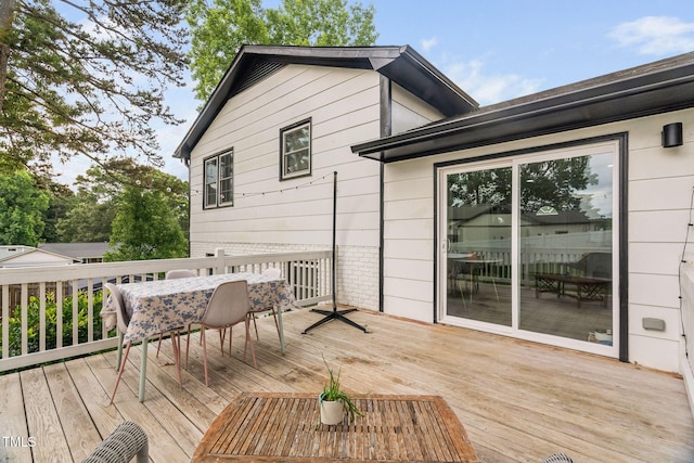 5400 Kaplan Dr, Raleigh, NC 27606 - wooden deck featuring outdoor dining area